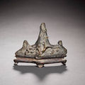 A bronze <b>brush</b> <b>rest</b> of mountainous form (bi shan). Ming Dynasty