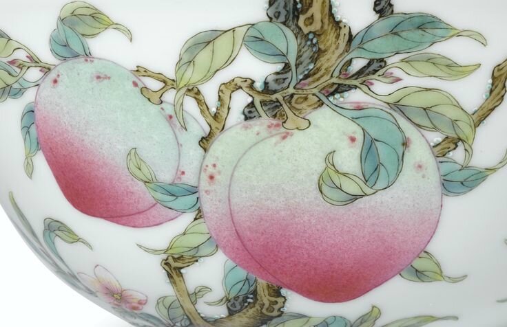 An extremely rare and superbly enamelled pair of Famille-Rose 'Peach' bowls, Marks and period of Yongzheng (detail)