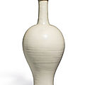 A tall white-glazed foliate-rimmed vase, Liao dynasty (907-1125)