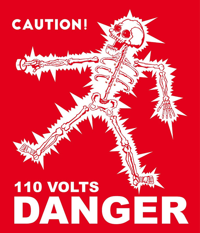 caution 110 volts danger skull high voltage warning