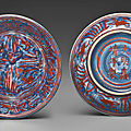 A very rare pair of small <b>iron</b>-<b>red</b> <b>decorated</b> blue and white dishes, Jiajing <b>iron</b>-<b>red</b> six-character marks within double-circles a