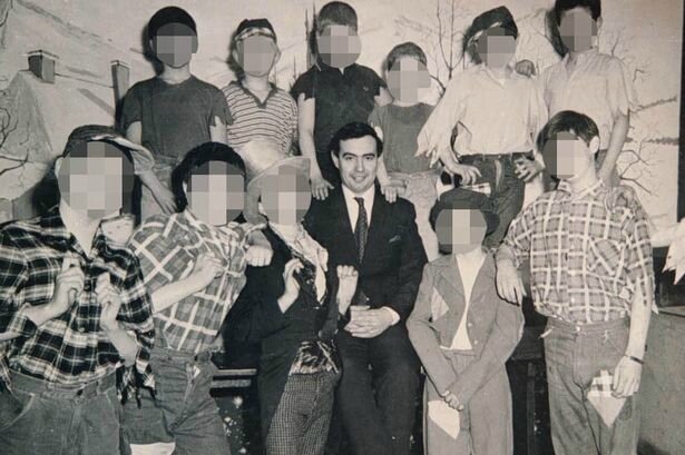 John Allen with children in his care