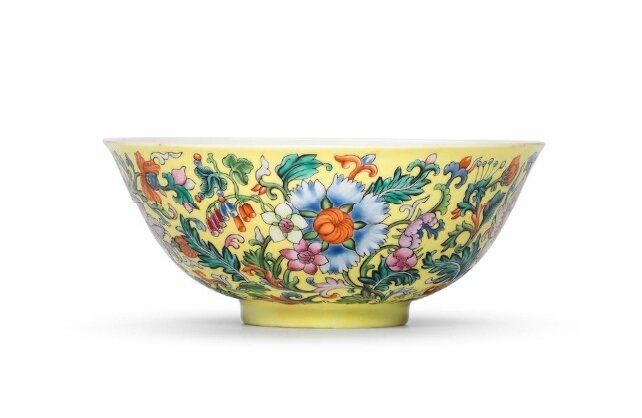 An exceptionally rare Imperial famille rose yellow-ground 'floral' bowl, Qianlong six-character mark and of the period (1736-1795)