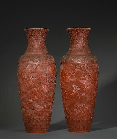 A pair of large carved cinnabar lacquer baluster vases, Qianlong marks, 19th century