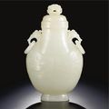 A white jade archaistic 'phoenix' flask and cover. Qing dynasty, <b>late</b> <b>18th</b> / <b>early</b> <b>19th</b> <b>century</b>
