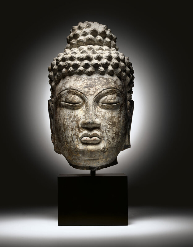 A rare limestone head of Buddha, Tang dynasty, Early 8th century, possibly Longmen caves