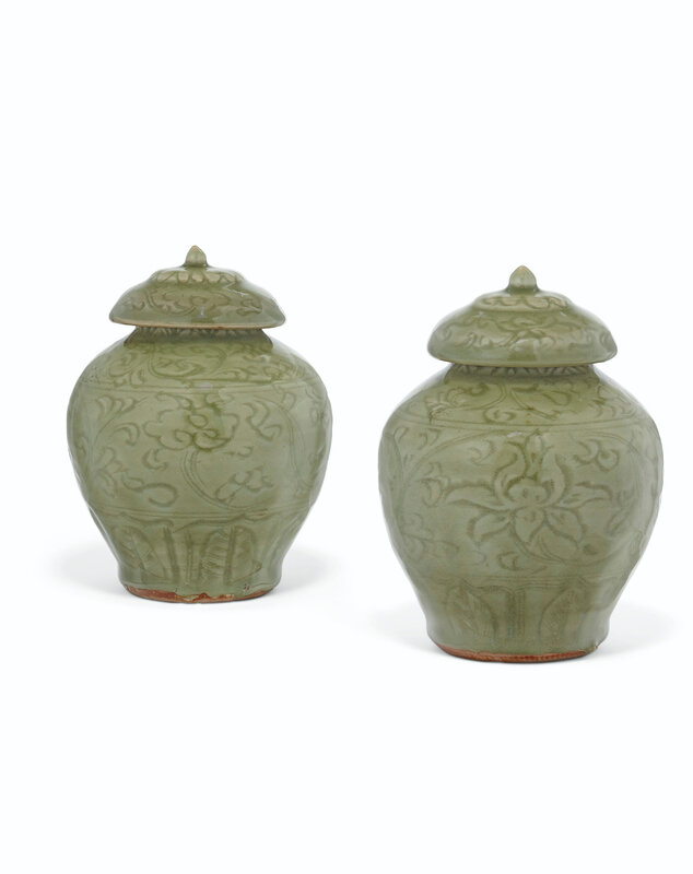 Two small carved Longquan celadon jars and covers, Ming dynasty (1368-1644)