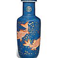 An <b>iron</b>-<b>red</b> <b>and</b> <b>gilt</b> <b>decorated</b> powder blue 'Fish' rouleau vase, Kangxi period (1662-1722)