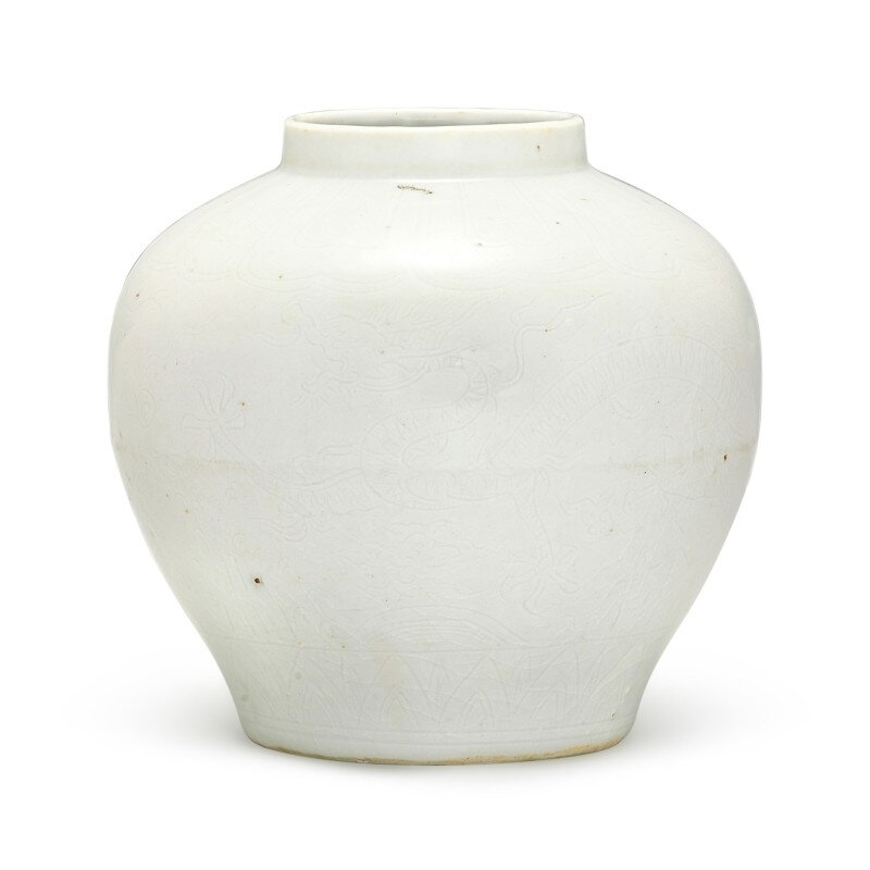 A white-glazed incised 'dragon' jar, Mark and period of Jiajing (1522-1566)