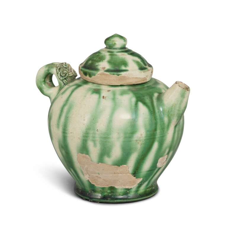 A small green-splashed pottery ewer and cover, Tang dynasty