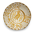 A <b>Fatimid</b> lustre pottery bowl, Egypt, 12th Century