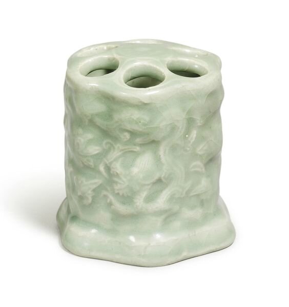 A rare moulded ‘Longquan’ celadon brush holder, Ming dynasty (1368-1644)