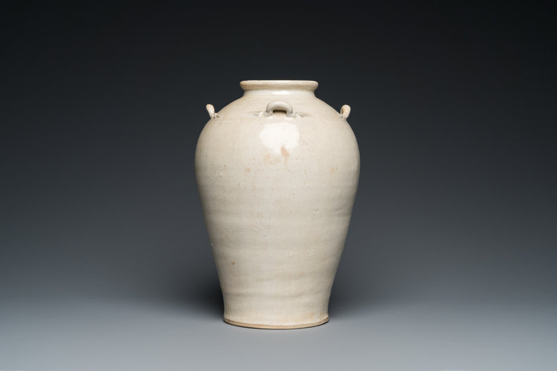 A Vietnamese white-glazed pottery vase with four ring handles, Ly dynasty, 11-13th century