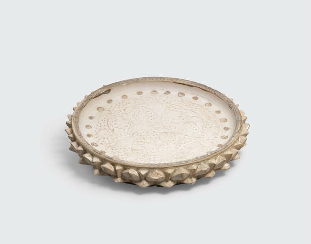 A small lotus-petal dish with incised decoration, Lý dynasty, 11th-13th century