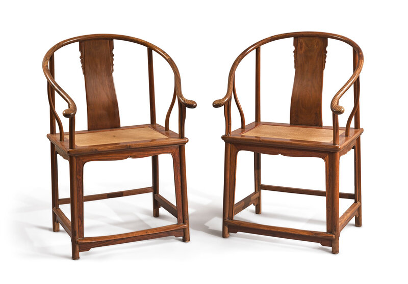 A pair of 'huanghuali' horseshoe-back armchairs, quanyi, Qing dynasty, 18th century