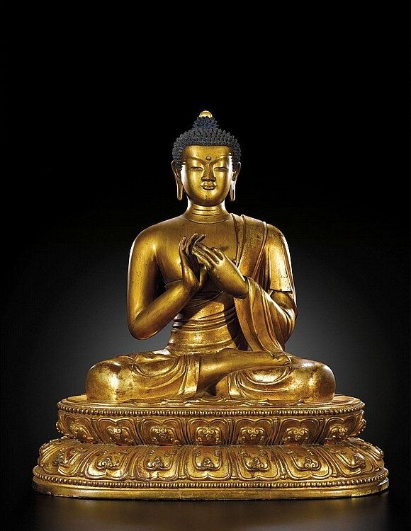 A large gilt-lacquered wood seated figure of Shakyamuni Buddha, Qing dynasty, Kangxi period