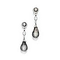 Rare and important pair of platinum, natural <b>pearl</b> and diamond earrings