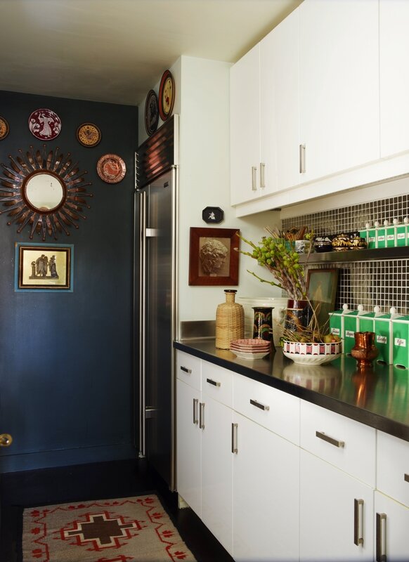 eclectic-kitchen-blue-wall-black-mini-tile-native-rug