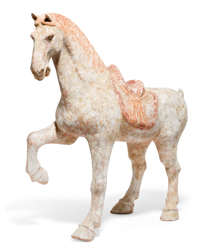 A painted red pottery figure of a prancing horse, Tang dynasty (618-907)