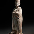A large painted pottery figure of a court lady, Tang dynasty (<b>AD</b> 618-907)