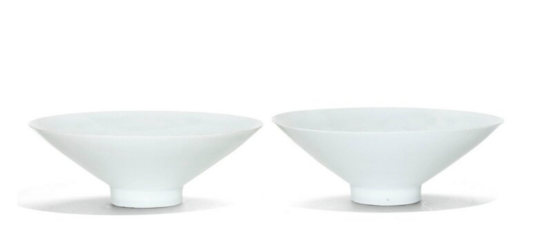 A matched pair of carved qingbai ‘Floral scroll’ bowls, Song dynasty