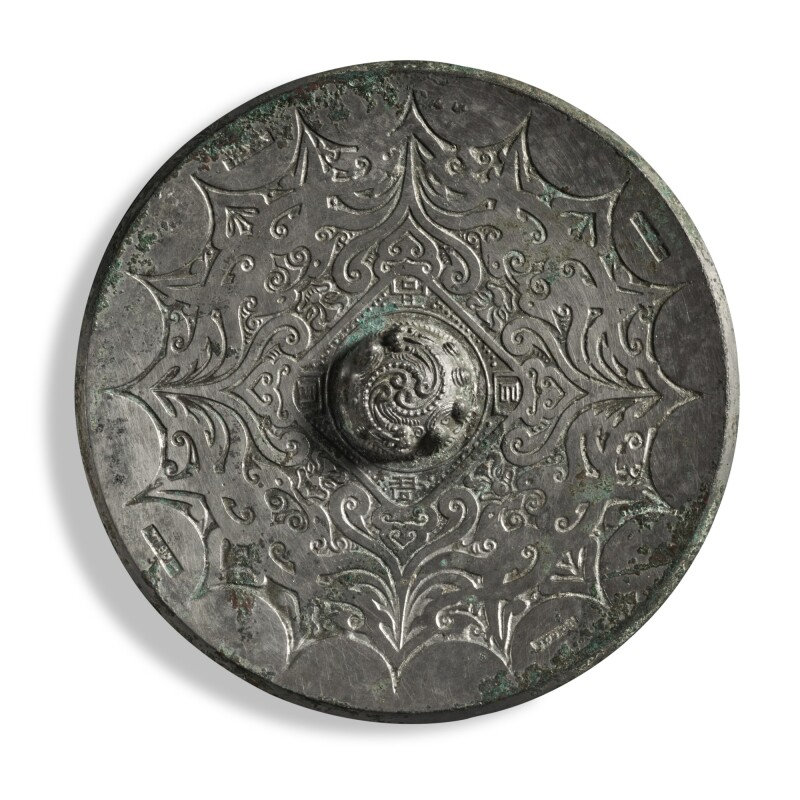 An inscribed bronze 'phoenix' mirror, Eastern Han dynasty (25-220)