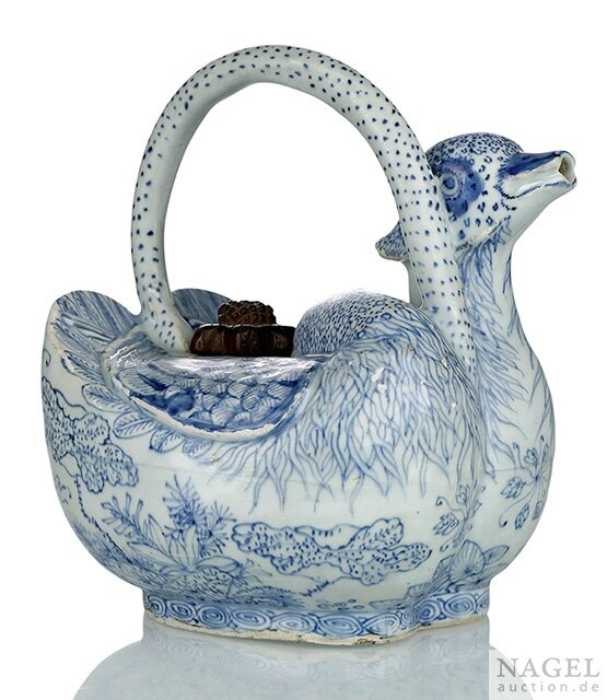 A very rare blue and white 'mandarin ducks' ewer, China, Transitional period