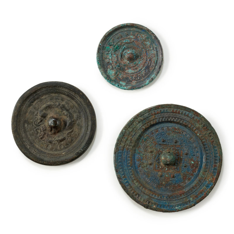 A group of three bronze mirrors, Han dynasty
