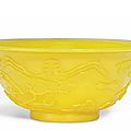 A Chinese yellow glass 'Landscape' bowl, late 19th-early 20th century