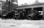 England_London_New_Malden_fire_station_and_firemen_fire_engines_tenders_circa_1930s_smart_formal_pose_shot_mono_cropped_tweaked_1_ANON