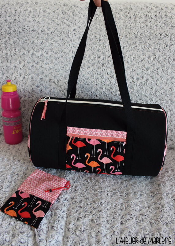 sac de sport rond flamand roses et noirs