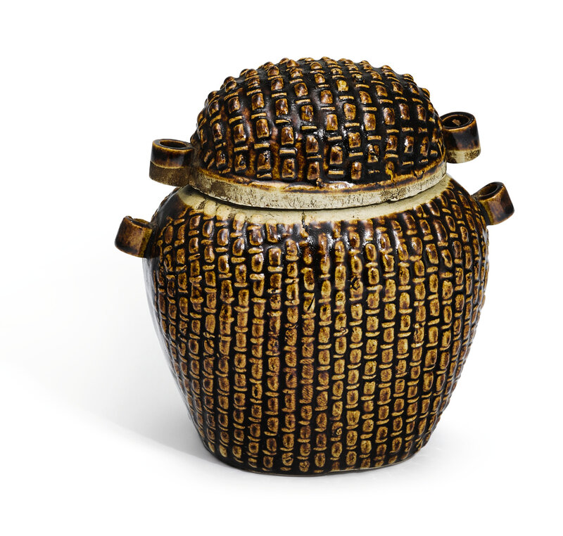 A rare brown-glazed 'basket-weave' jar and cover, Song dynasty (960-1279)