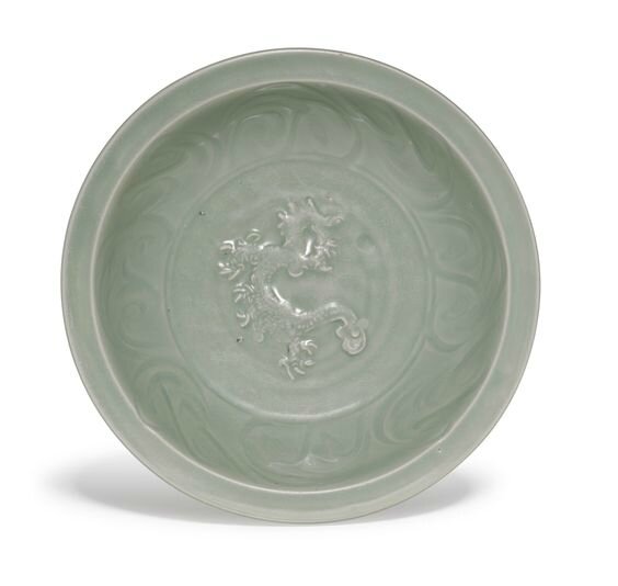 A moulded ‘Longquan’ celadon ‘dragon’ dish, Yuan dynasty (1279-1366)