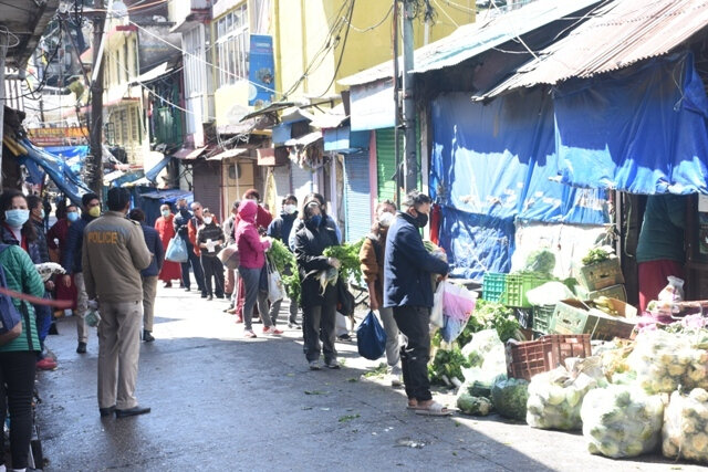 Residents-of-McLoed-Ganj-observing-distance-while-shopping
