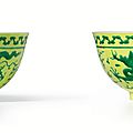 A pair of fine <b>yellow</b>-<b>ground</b> <b>green</b>-<b>enamelled</b> 'Dragon' bowls, Marks and period of Yongzheng (1723-1735)