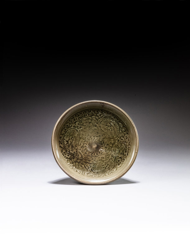 A moulded 'Yaozhou' celadon ‘chrysanthemum’ bowl, Northern Song dynasty