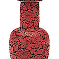 A rare and finely carved red <b>lacquer</b> mallet-form vase, China, Ming dynasty, 15th-16th century