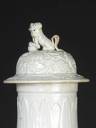 A_rare_white_glazed_relief_decorated_vase_and_cover2