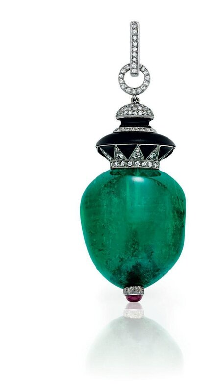 An Art Deco emerald, diamond and onyx pendant, by Janesich