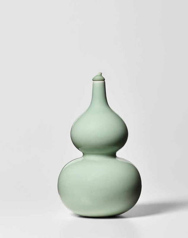 A celadon-glazed double-gourd vase, Qianlong seal mark and of the period (1736-1795)