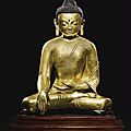 A large gilt-bronze figure of <b>Buddha</b> <b>Shakyamuni</b>, Tibet, 14th-15th Century