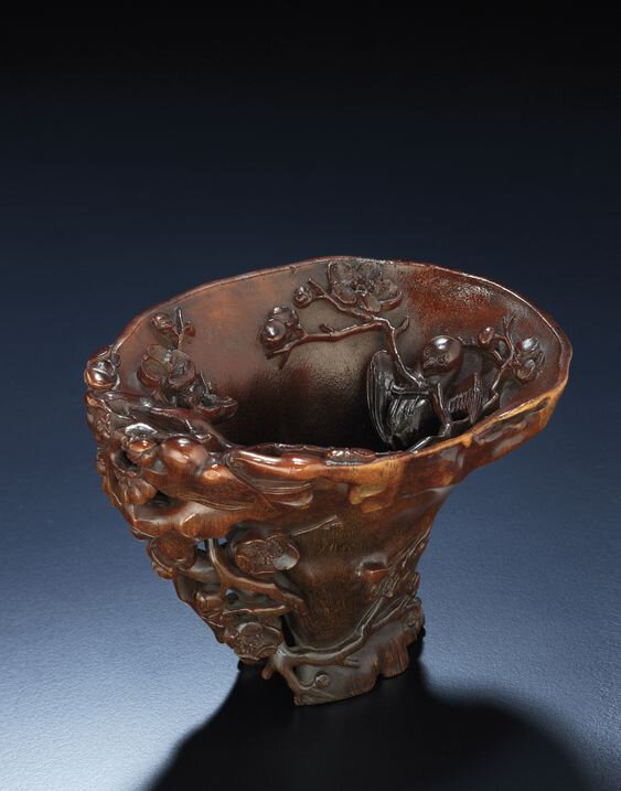 An exquisitely carved rhinoceros horn libation cup, Qing dynasty, 17th-18th century