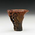 A Magnificent Rhinoceros Horn '<b>Hawks</b>' Libation Cup, signed You Kan. Qing Dynasty, 17th-18th Century 