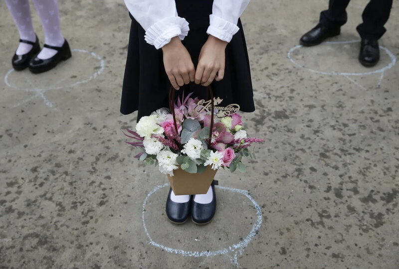 Novosibirsk, Russia First-grade students attend a ceremony marking the beginning of a new academic year at the city’s School 218 Photograph Kirill Kukhmar
