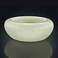 A rare white jade bajixiang <b>alms</b> bowl. Qianlong period (1736-1795). 