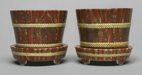 A pair of faux-bois jardinières and drainage trays, 19th-20th century 2016