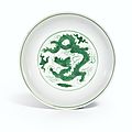 A green-glazed 'Dragon' dish, <b>Mark</b> <b>and</b> <b>period</b> <b>of</b> <b>Hongzhi</b> (<b>1488</b>-<b>1505</b>)