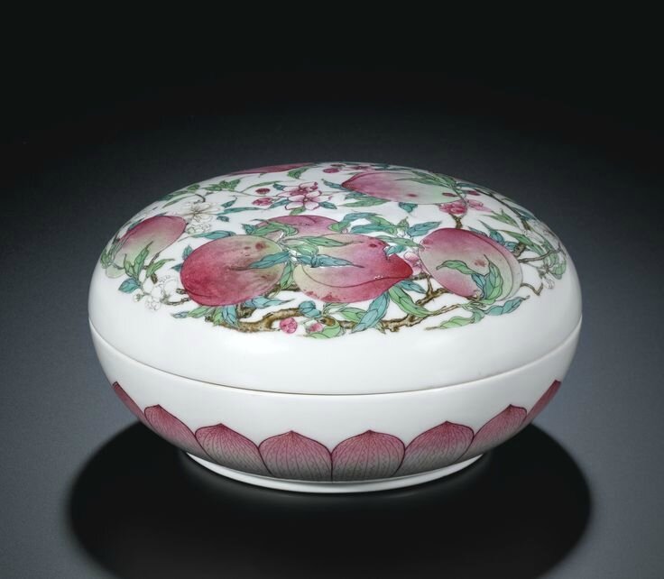A superbly enamelled and possibly unique famille-rose 'Peach' box and cover, Mark and period of Yongzheng (1723-1735)