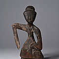A lacquered wood figure of a female dancer, Han dynasty (206 BC - AD 220)