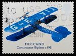 6274787-timbre-poste-britannique-mettant-en-vedette-un-biplan-de-meccano